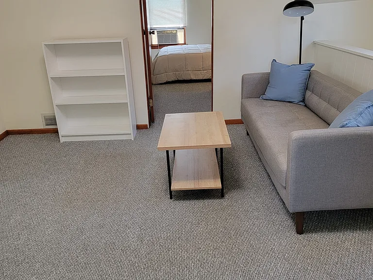 Living Area leading to Bedroom