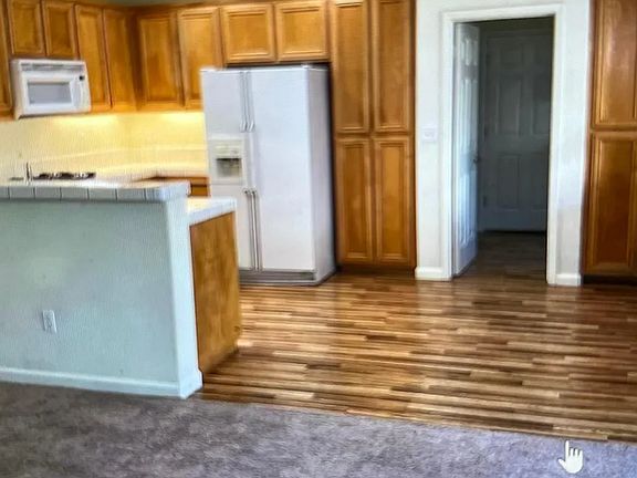 kitchen from family room and door to mud room