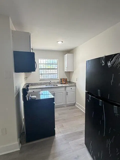 1052 NW 4th St — Photo 3