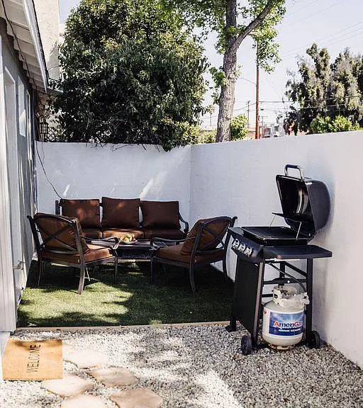 PRIVATE FENCED PATIO WITH BBQ GRILL & OUTDOOR SEATING/FURNITURE