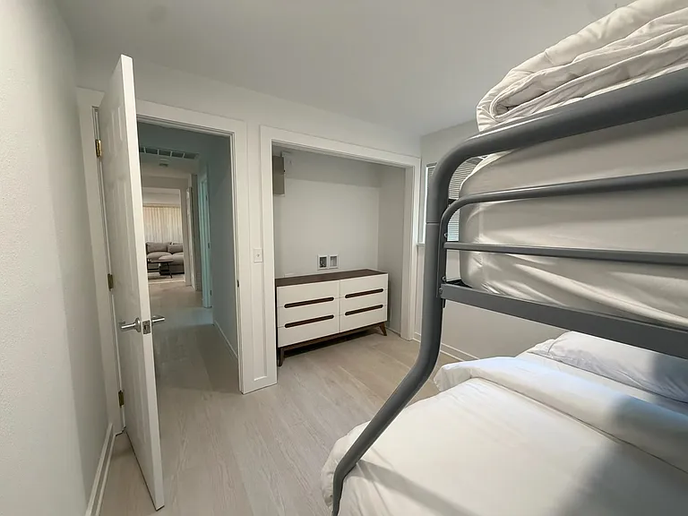 Downstairs bunk beds with dresser
