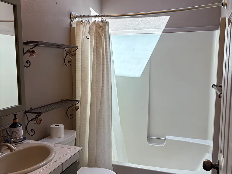 Second upper bathroom with skylight