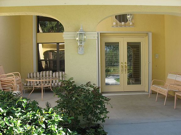 4 FRONT ENTRANCE WITH MOTION LIGHTS AND CHANDELIER