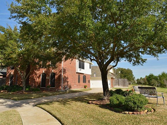 Developed neighborhood with well-maintained exterior and lawn
