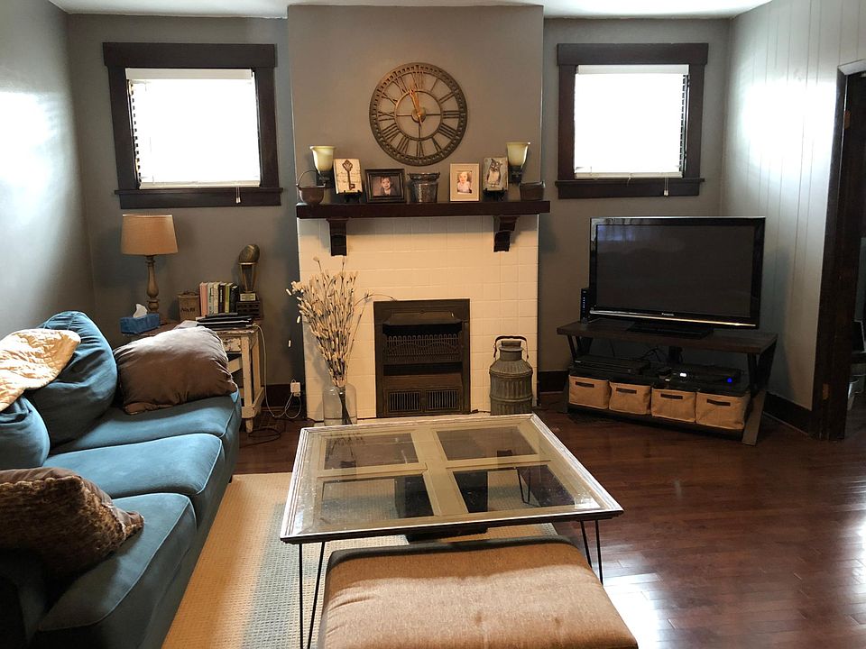 Living Room with Decorative Fireplace