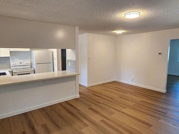 Open concept living area ideal for entertaining or active small families