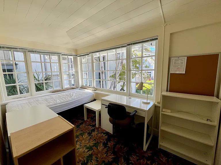 Female small private room with French windows attached to double