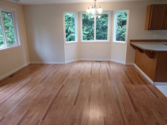 This is the back room. It's a dining area with additional space (family room)