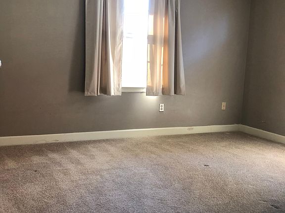 Carpeted bedrooms with large closets