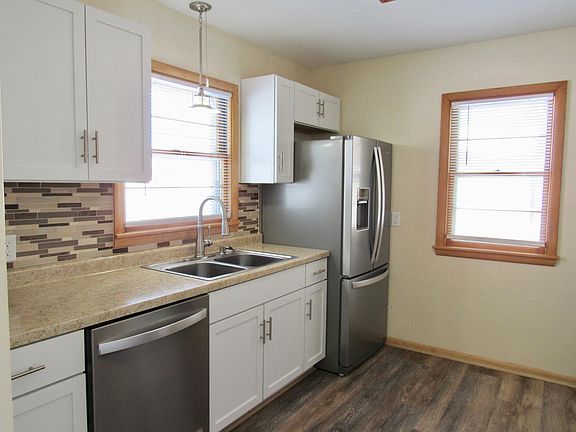 Kitchen- New fridge and Dishwasher. All new cabinets and counter tops with new sink and garbage disposal. New back splash throughout. New Vinyl Plank Flooring.