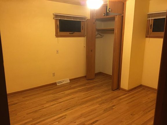 bedroom - has been re-painted, but hardwood floors, windows and 2 closets are the same!