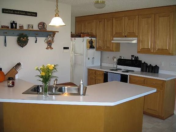 Kitchen open to den and breakfast area.
