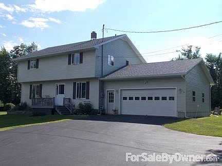 Southern side of house.
						:
						Deck and enclosed screen porch.