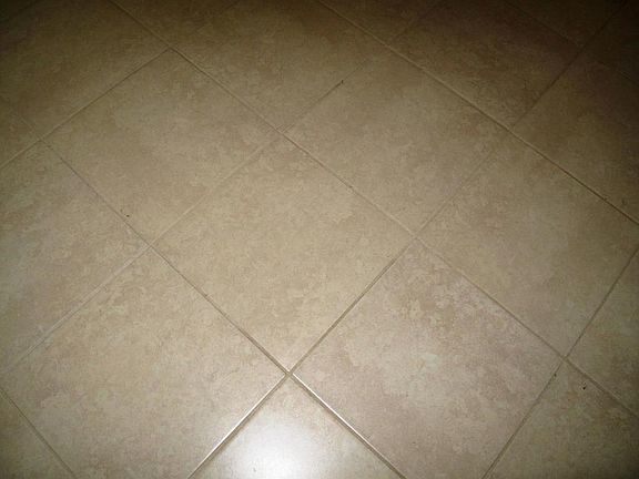 Neutral tile throughout