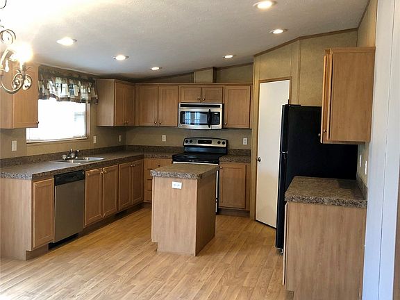 4th image of 7092 N 50th St W