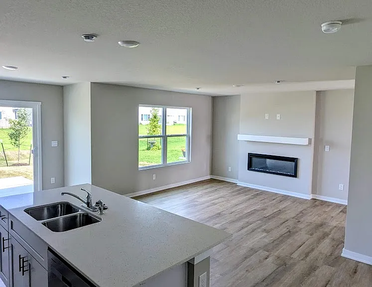 Kitchen Island and Living Room Fireplace