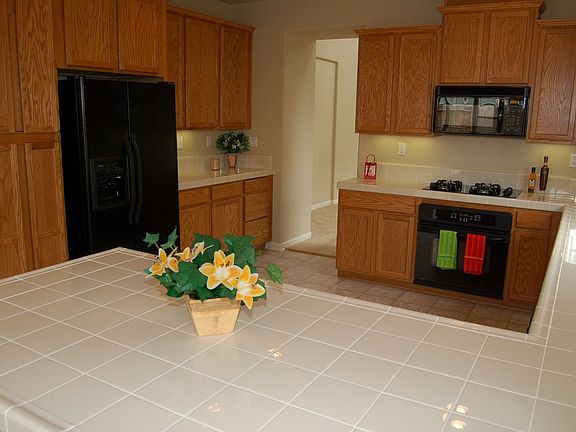 Large kitchen with room for 2; all appliances inc. washer and dryer remain