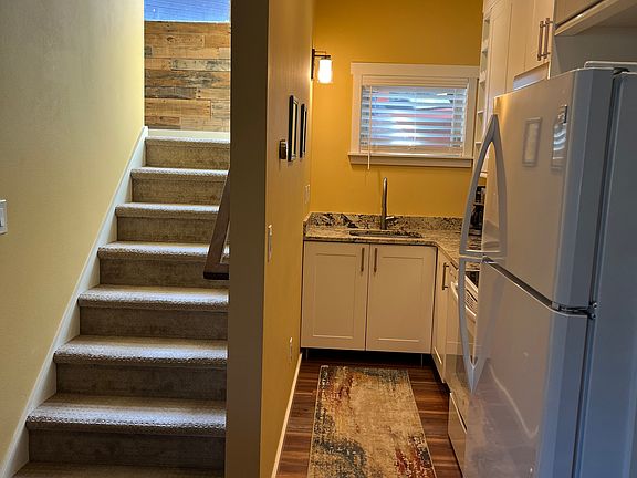 Kitchen and stairs to bedrooms.