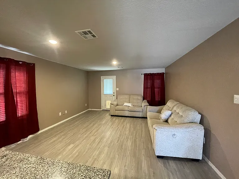 Open concept living and dinning with Backyard door (doggy door included)