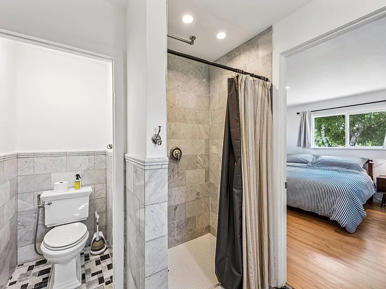 Upstairs marble bathroom