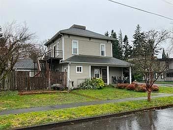 Front of House & Partial of Back Yard