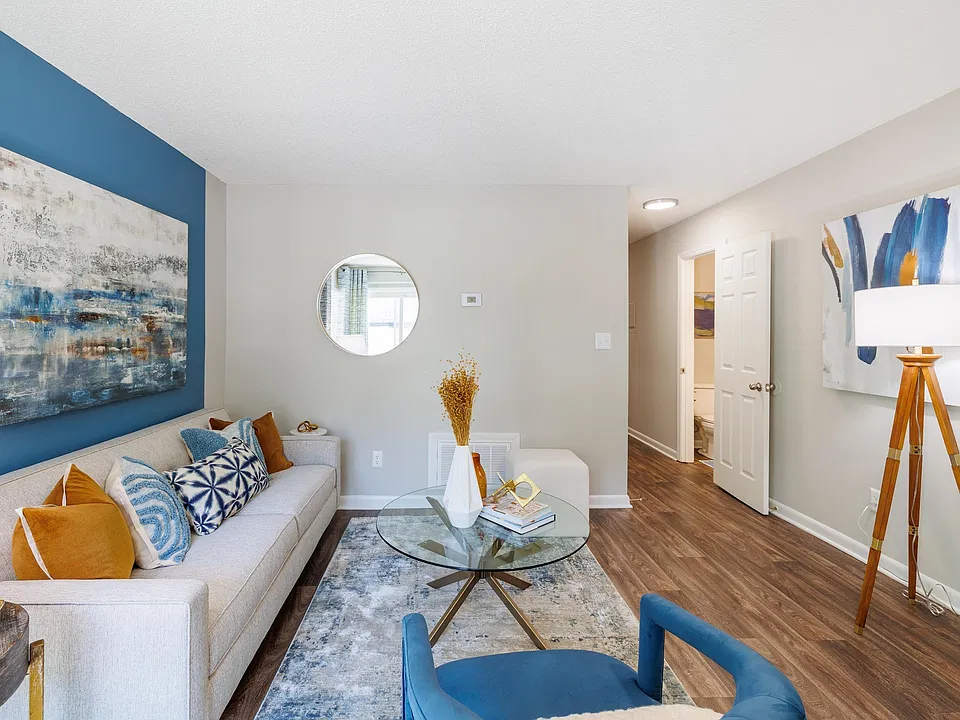 Spacious living room with hardwood-style flooring