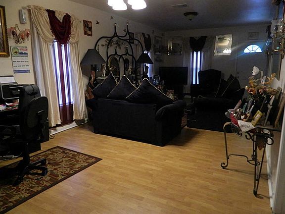 Beautiful flooring in open living area.