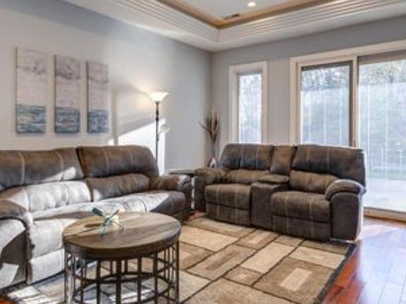 Walk out your Great Room door onto your private porch and you are ten feet from the Water! Recessed lighting throughout, Tray Ceilings in both bedrooms and Great Room. Beautiful but very private! view!