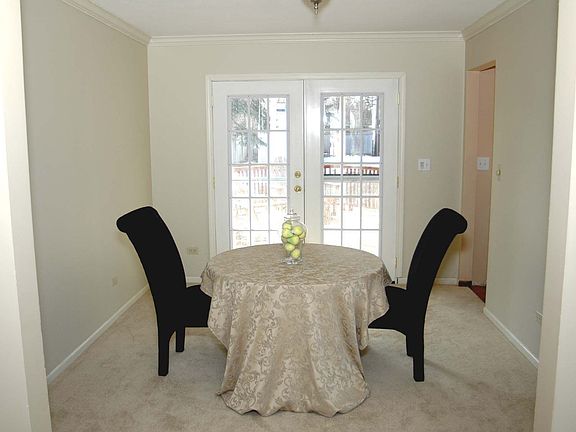 Formal Dining Room with French Doors to Covered Deck Area