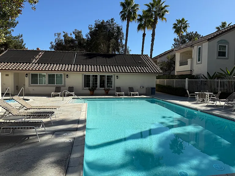 Condominium pool steps from unit.