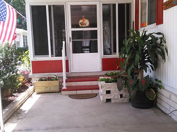 front patio with kio fish pond