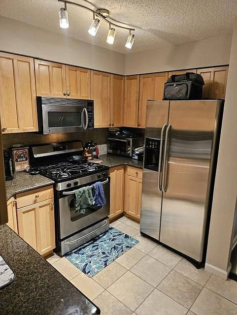 Eat-in kitchen with pass-through to living room