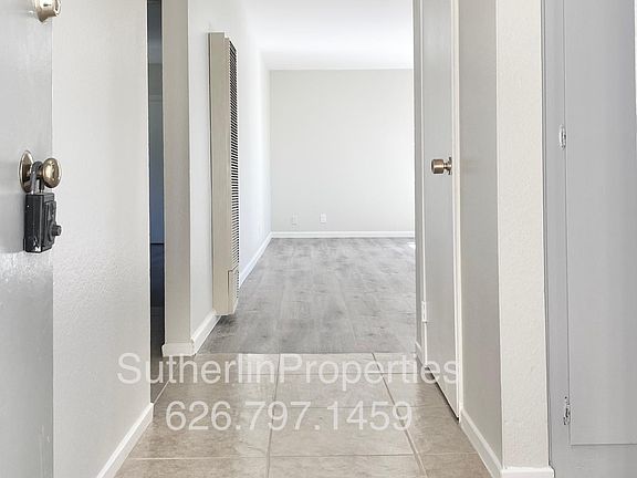 This lovely apartment home is on the top, second level. Entering, there is a practical coat closet for shoes and coats