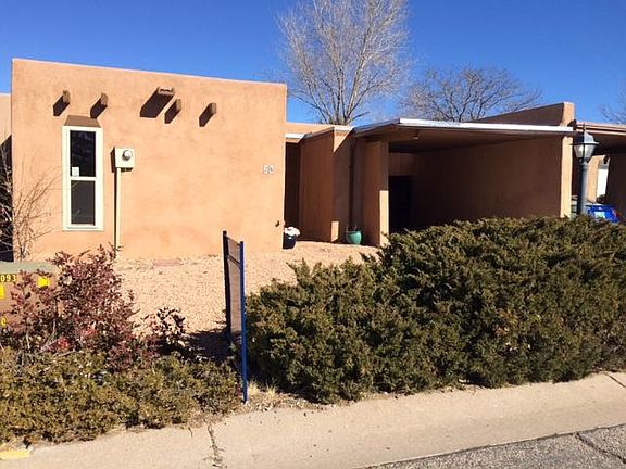 Front with Carport and private, covered entrance. Room to pa