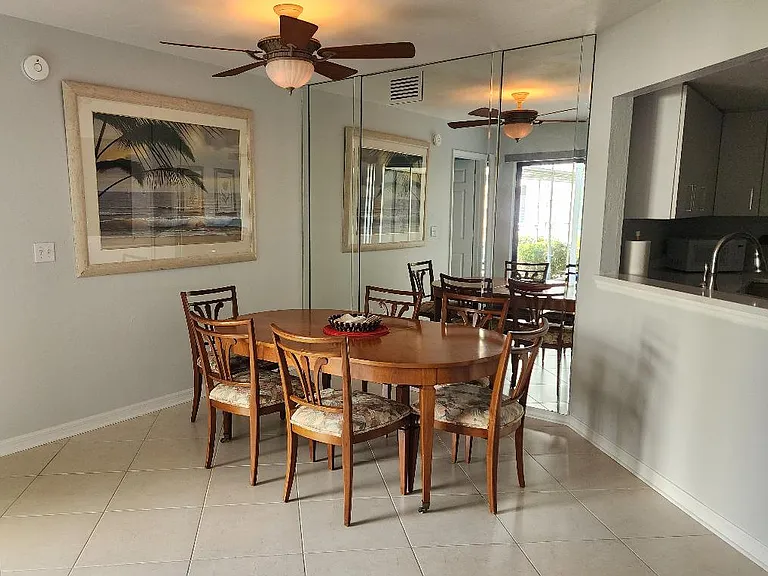Dining area with adjacent pass-thru to kitchen.