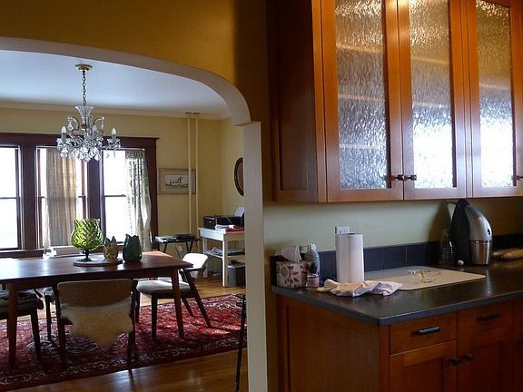 Kitchen flows into dining room and living room