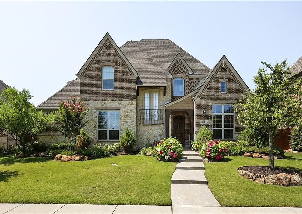 Welcome home to a beautiful Highland built home with wonderful drive up and landscaping!