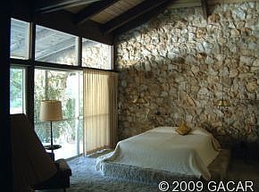 Soaring custom-designed natural stone walls throughout; this is Master Suite