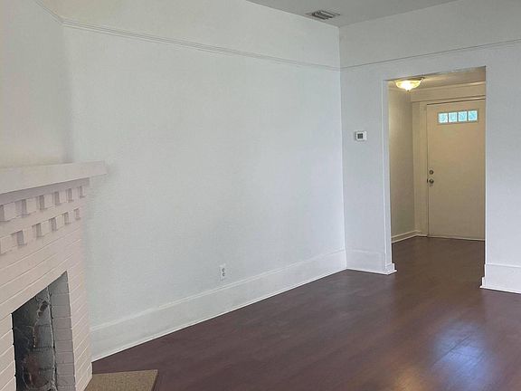 Living room looking into front entryway