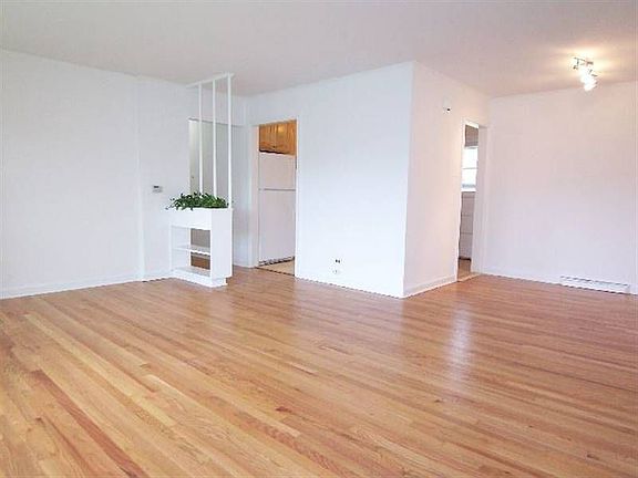 Living Room view to Dining Room and Kitchen