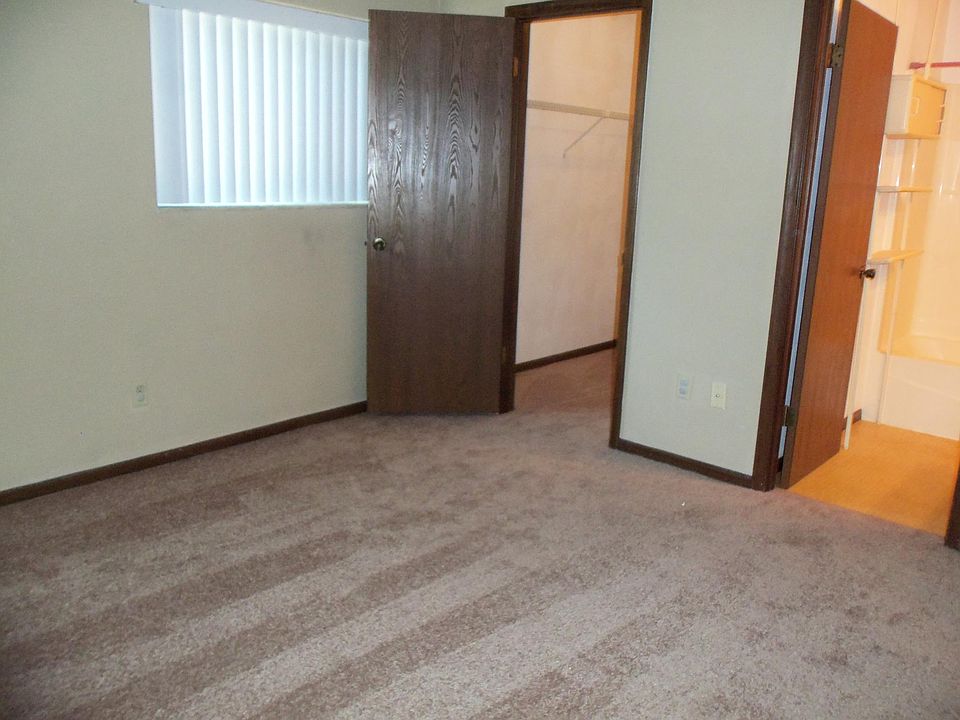 bedroom with walkin closet and bathroom