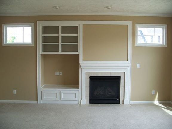 Living room w/fireplace & media center