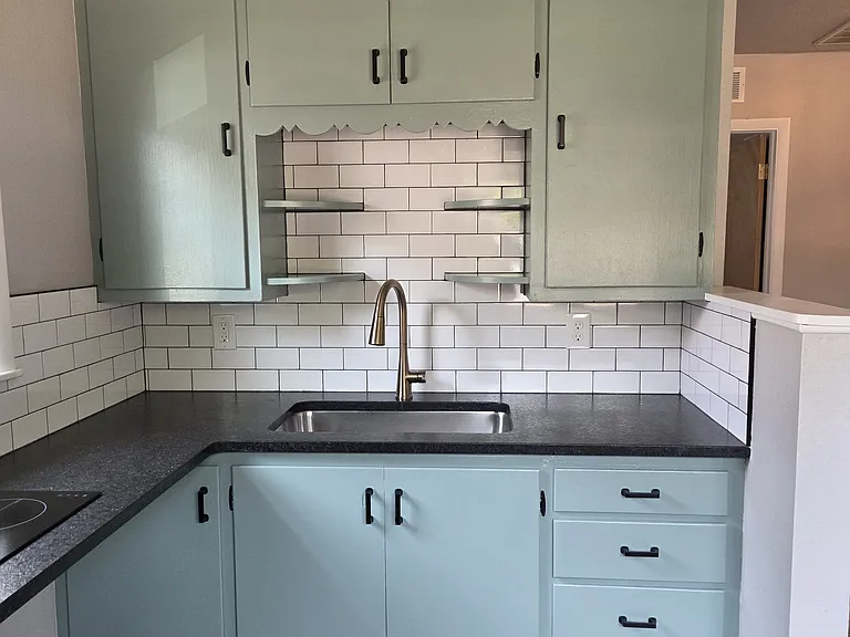Updated kitchen - new counters, new sink, new faucet