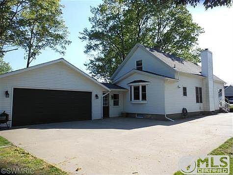 Back view with attached garage