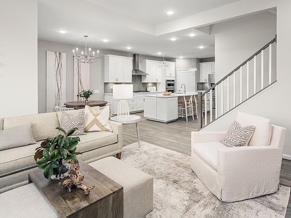 Open Floor Plan Showcasing the Gathering Room, Kitchen and Cafe.