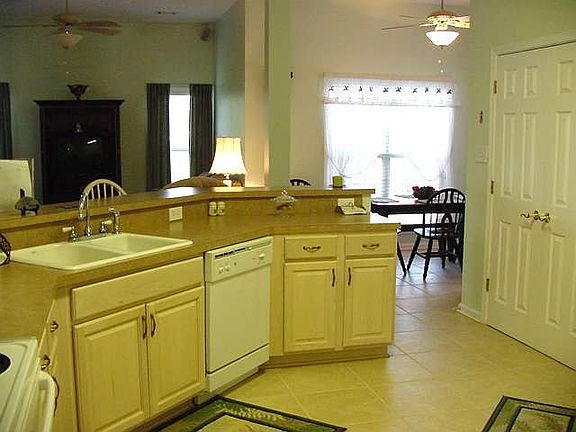 Kitchen View of Pantry, Family Room & Breakfast Nook