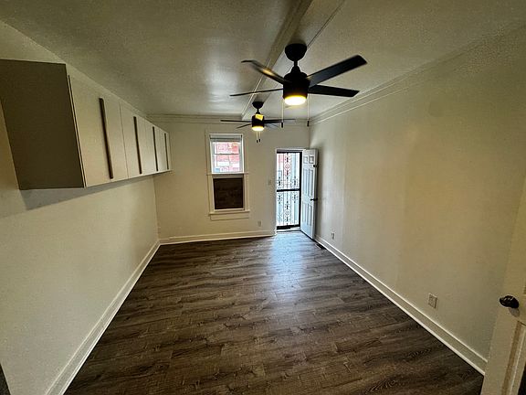 Large bedroom with backdoor