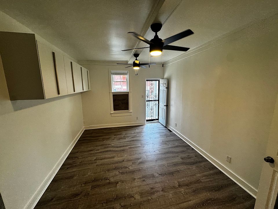 Large bedroom with backdoor