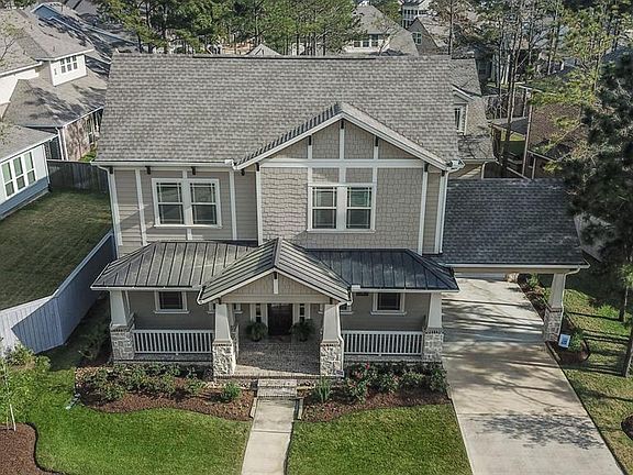 Tucked into the charming neighborhood of Liberty Branch in Creekside Park-The Woodlands.