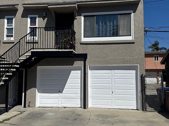 Exterior of unit 1060 above garage and parking spot